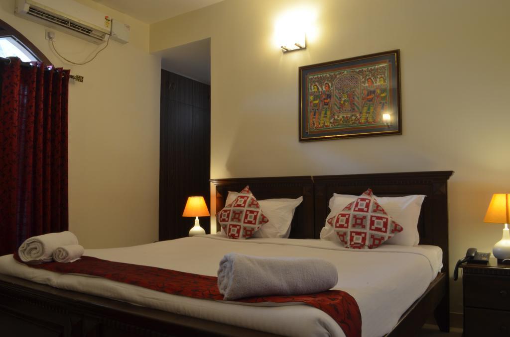 Luxtay Suites Bangalore Room photo
