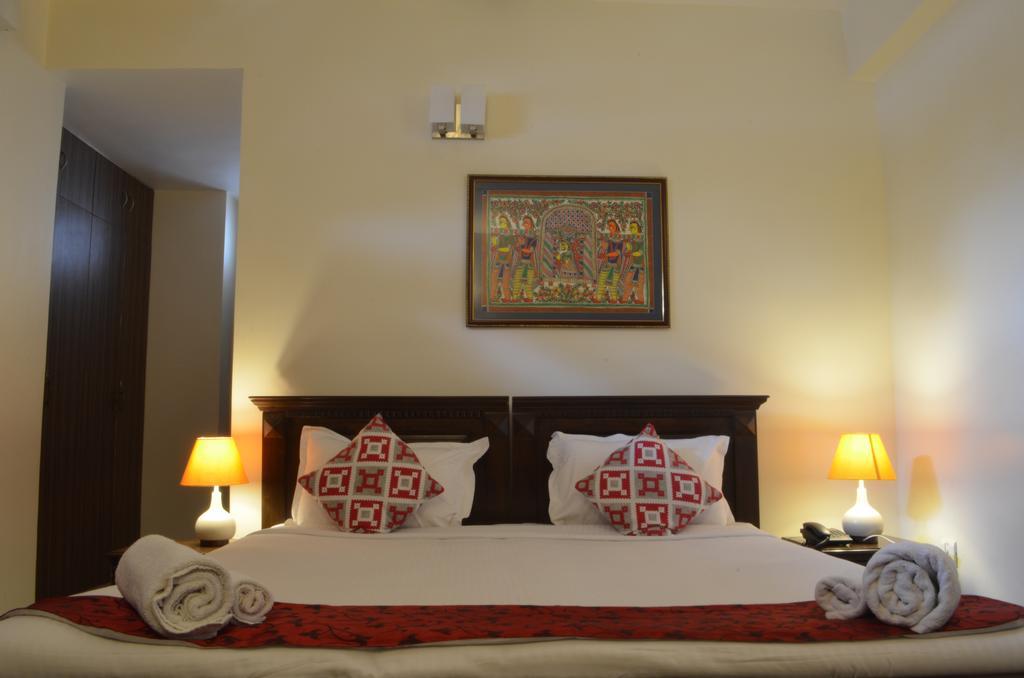 Luxtay Suites Bangalore Room photo
